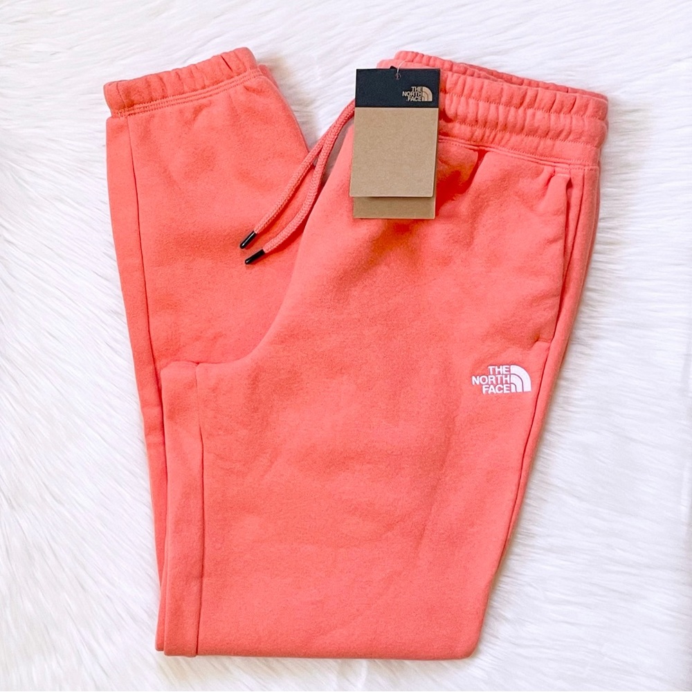 The North Face Women’s Half Dome Fleece Sweatpants In Coral Sunrise